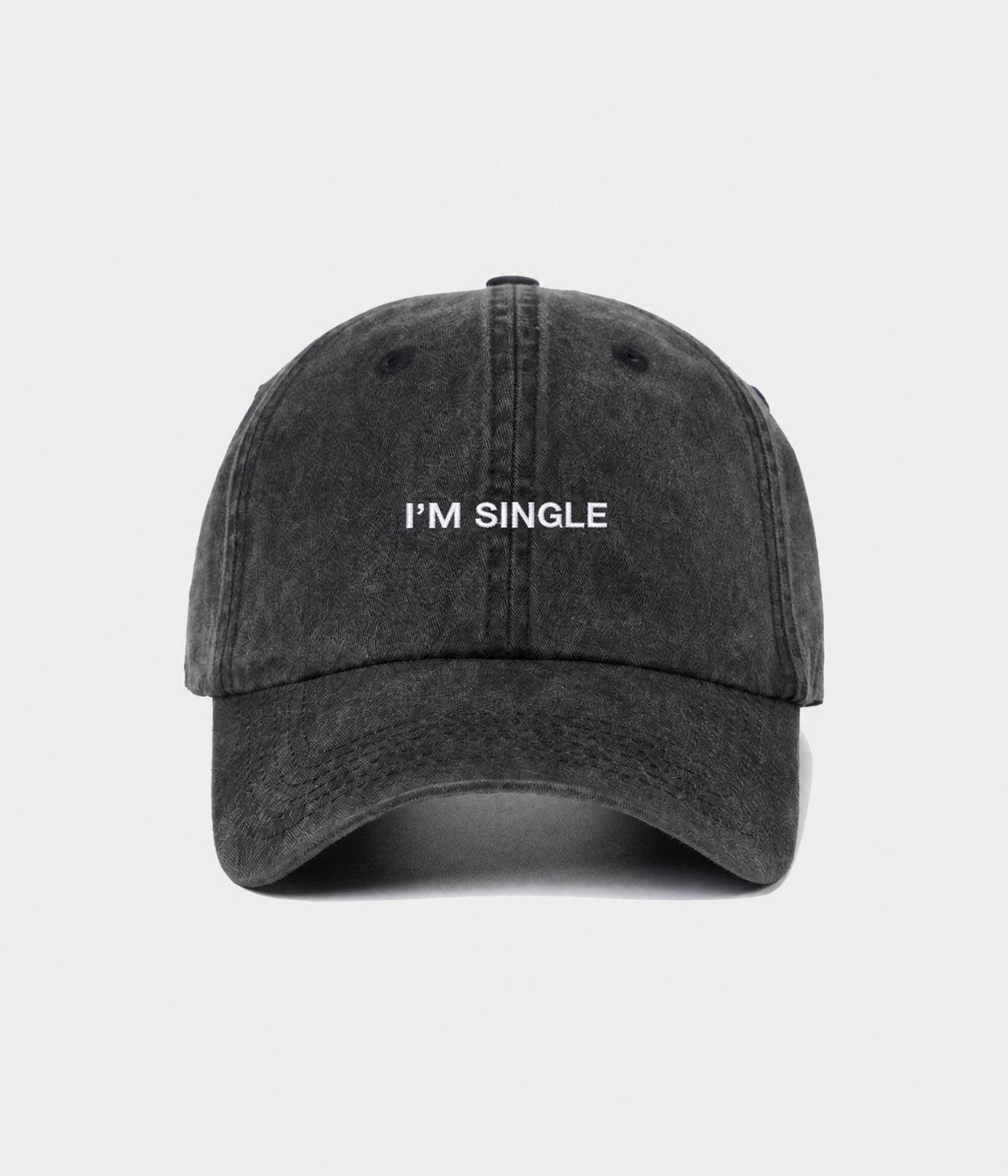 WASHED I'M SINGLE. washed cotton dad cap in BLACK, front view