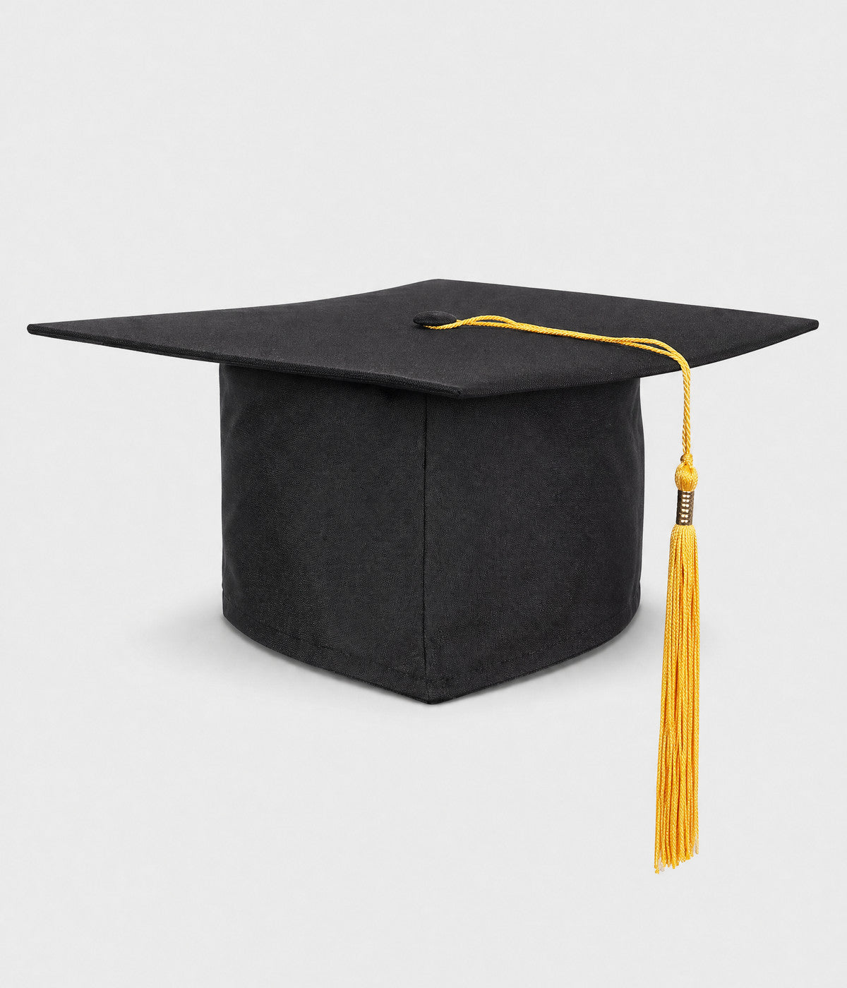 GRADUATION CAP. black mortarboard with gold tassel, front view