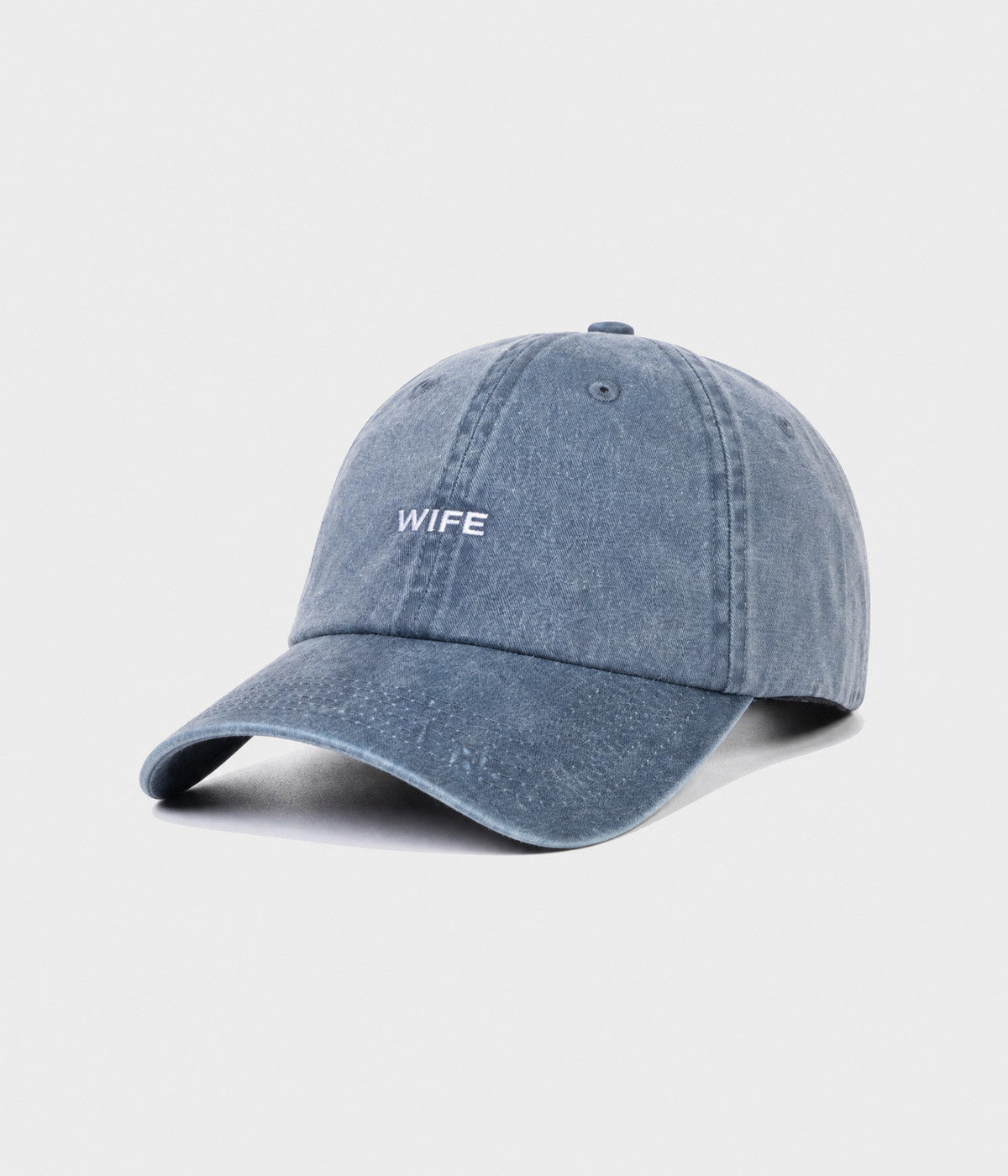 WASHED WIFE. washed cotton dad cap in NAVY, side view