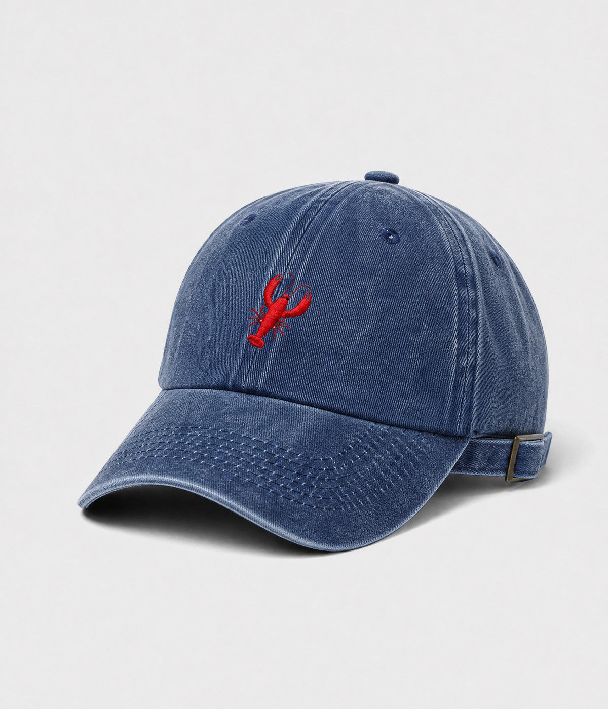 WASHED LOBSTER. washed cotton dad cap in NAVY, side view