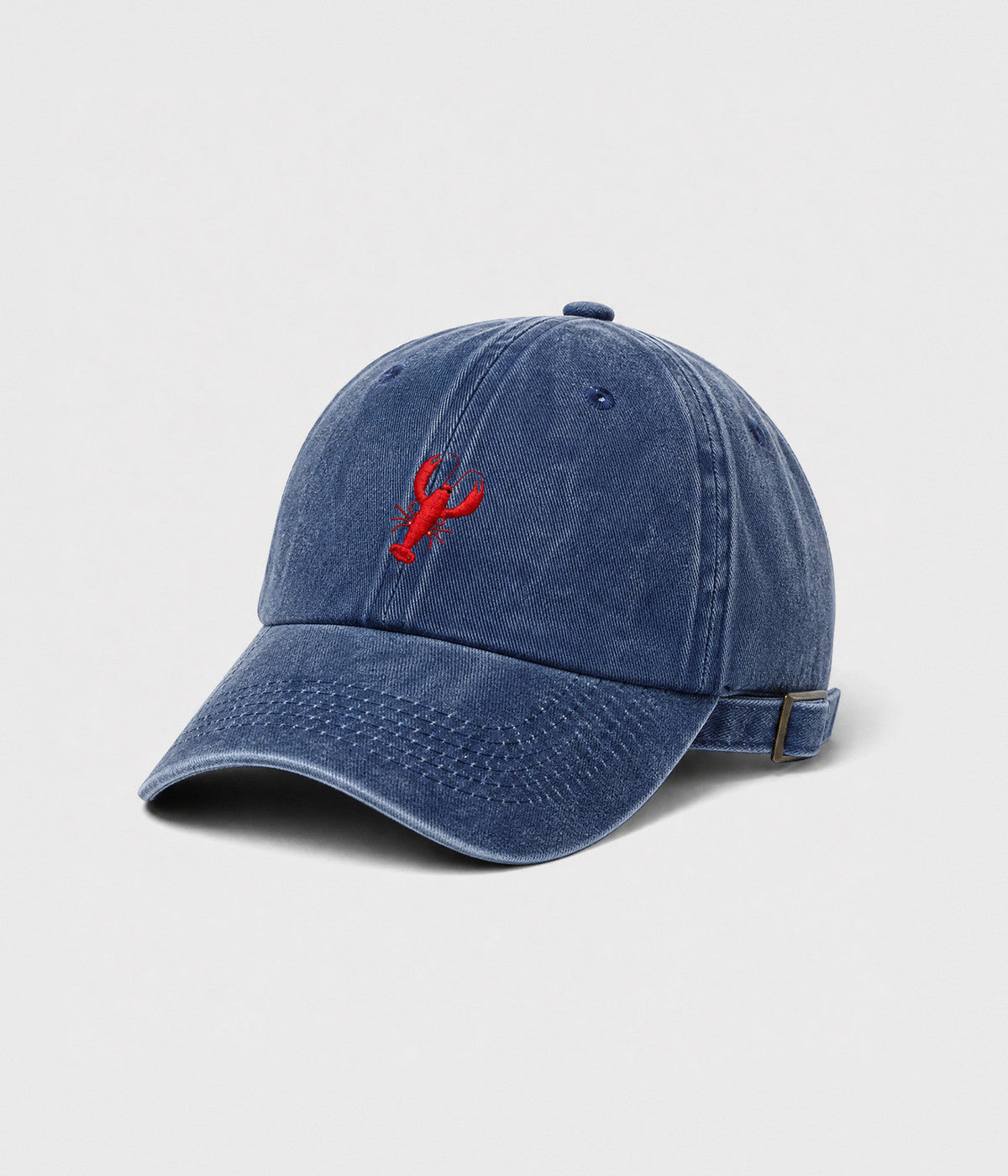 WASHED LOBSTER. washed cotton dad cap in NAVY, side view