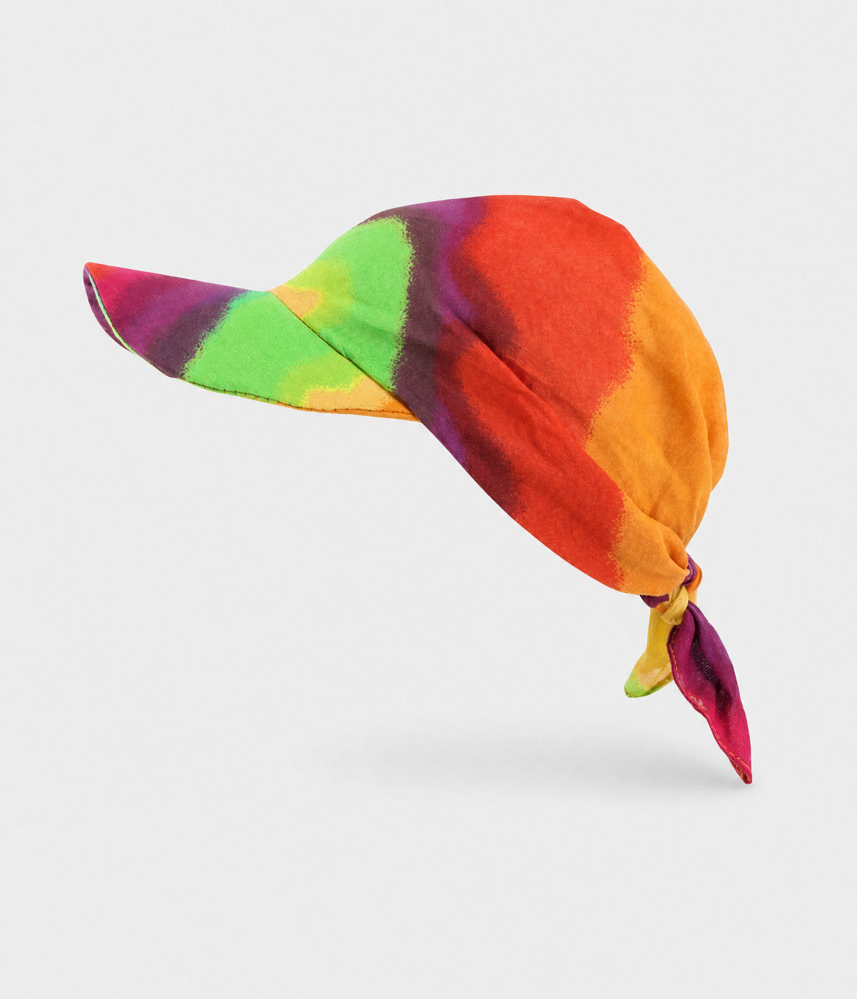 PEAKED BANDANA CAP. peaked bandana cap in rainbow print, front view
