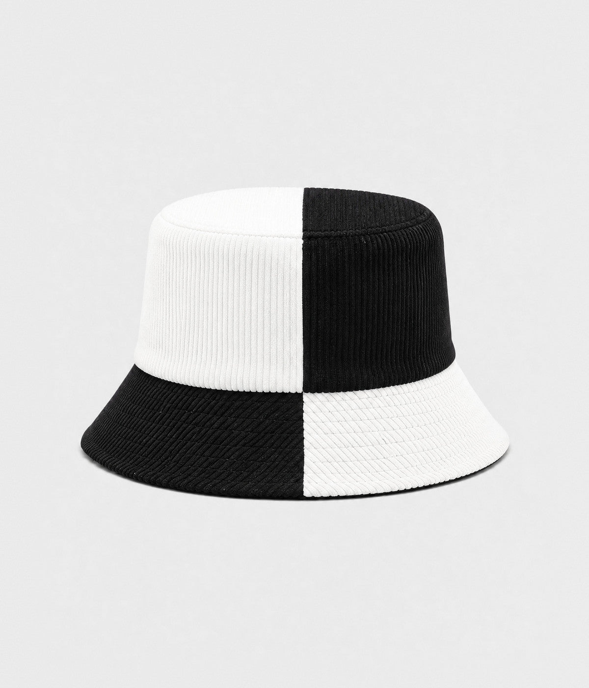 PATCHWORK BUCKET. corduroy bucket hat in BLACK WHITE, front view