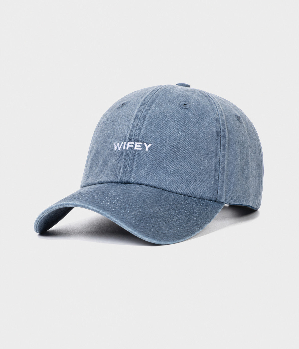 WASHED WIFEY. washed cotton dad cap in NAVY, side view