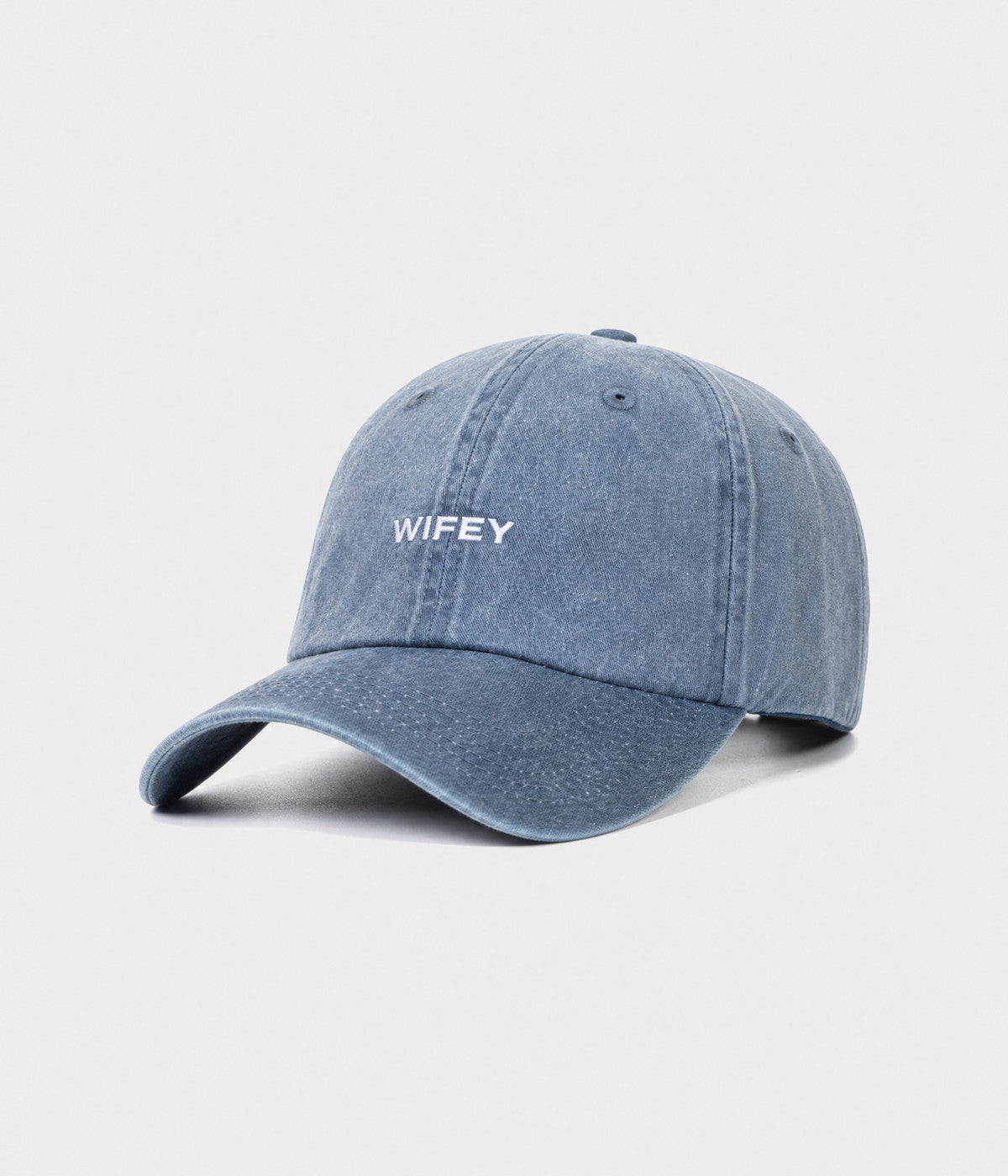 WASHED WIFEY. washed cotton dad cap in NAVY, side view