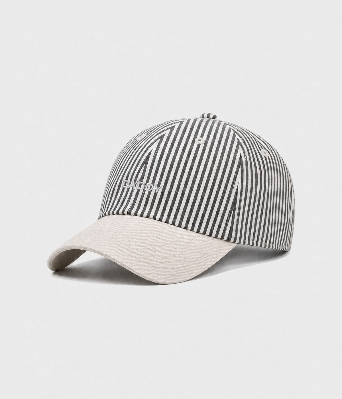 STRIPED DADDY. striped cotton cap in black, side view