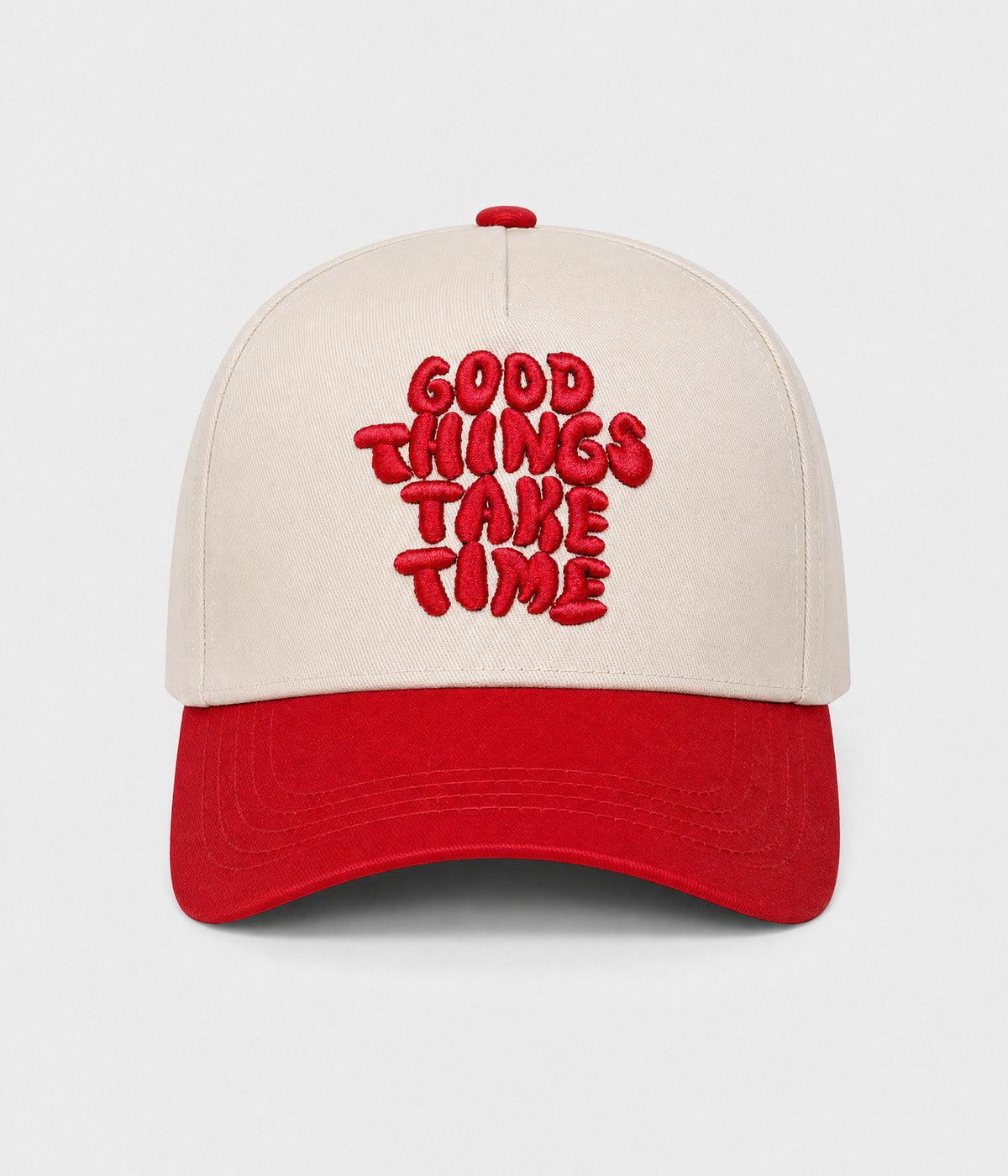 GOOD THINGS TAKE TIME SNAPBACK. cream cotton snapback with RED visor, front view