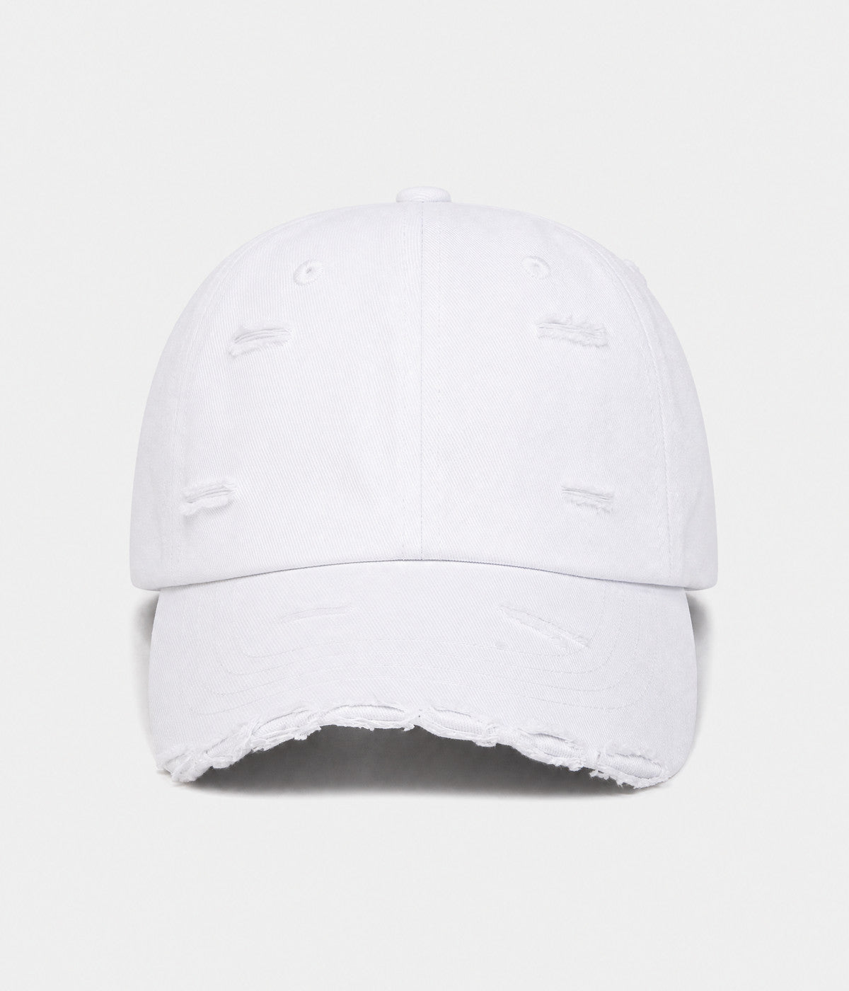RIPPED COTTON. distressed cotton cap in white, front view