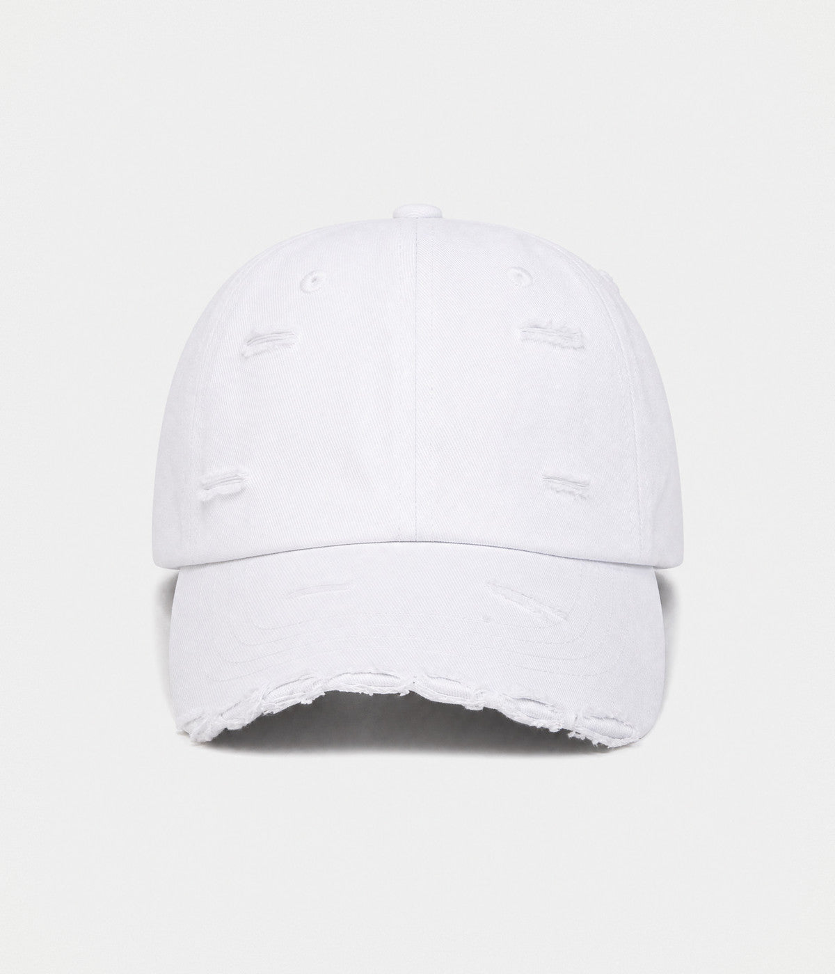 RIPPED COTTON. distressed cotton cap in white, front view