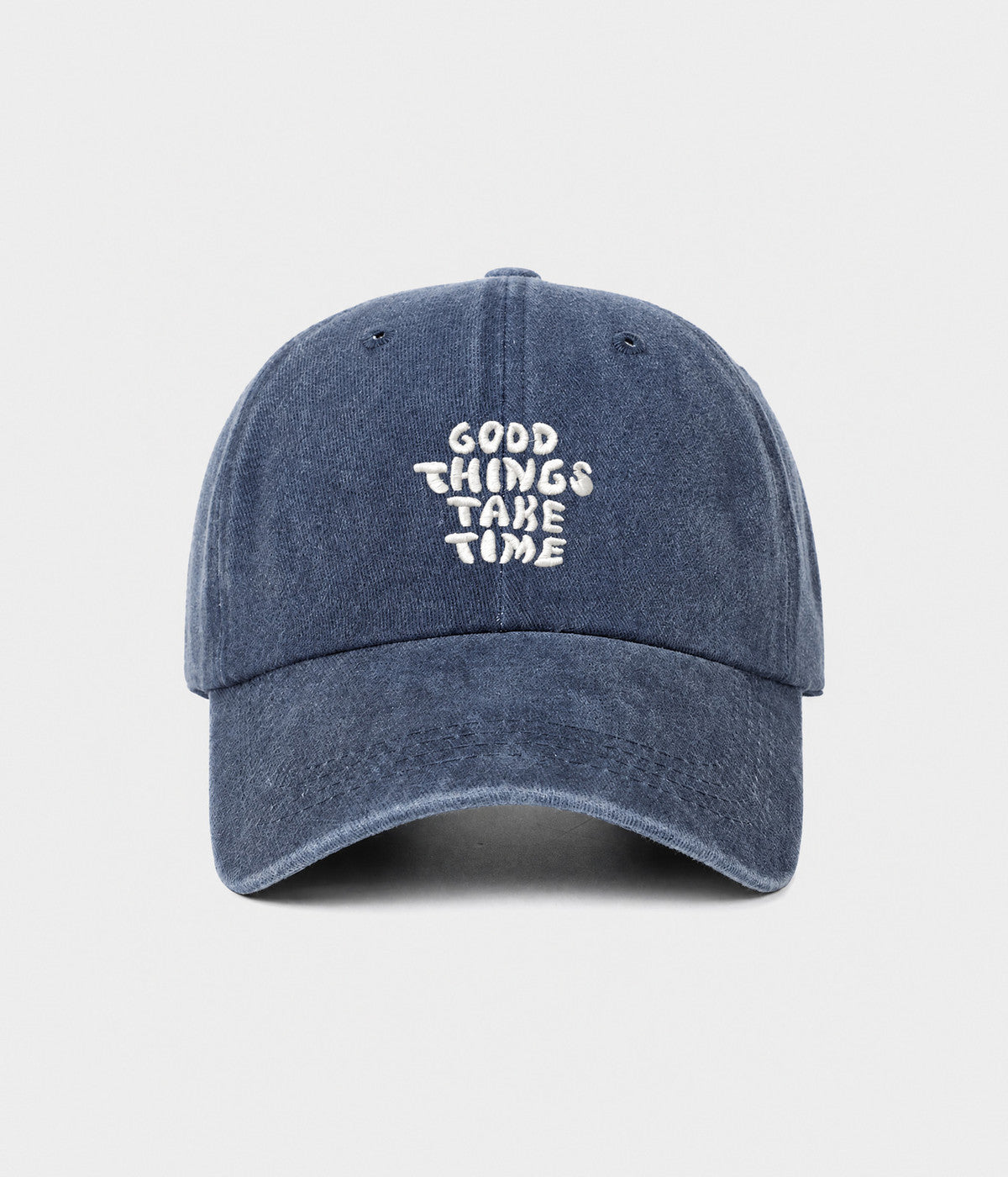 GOOD THINGS TAKE TIME. washed cotton dad cap in navy, front view