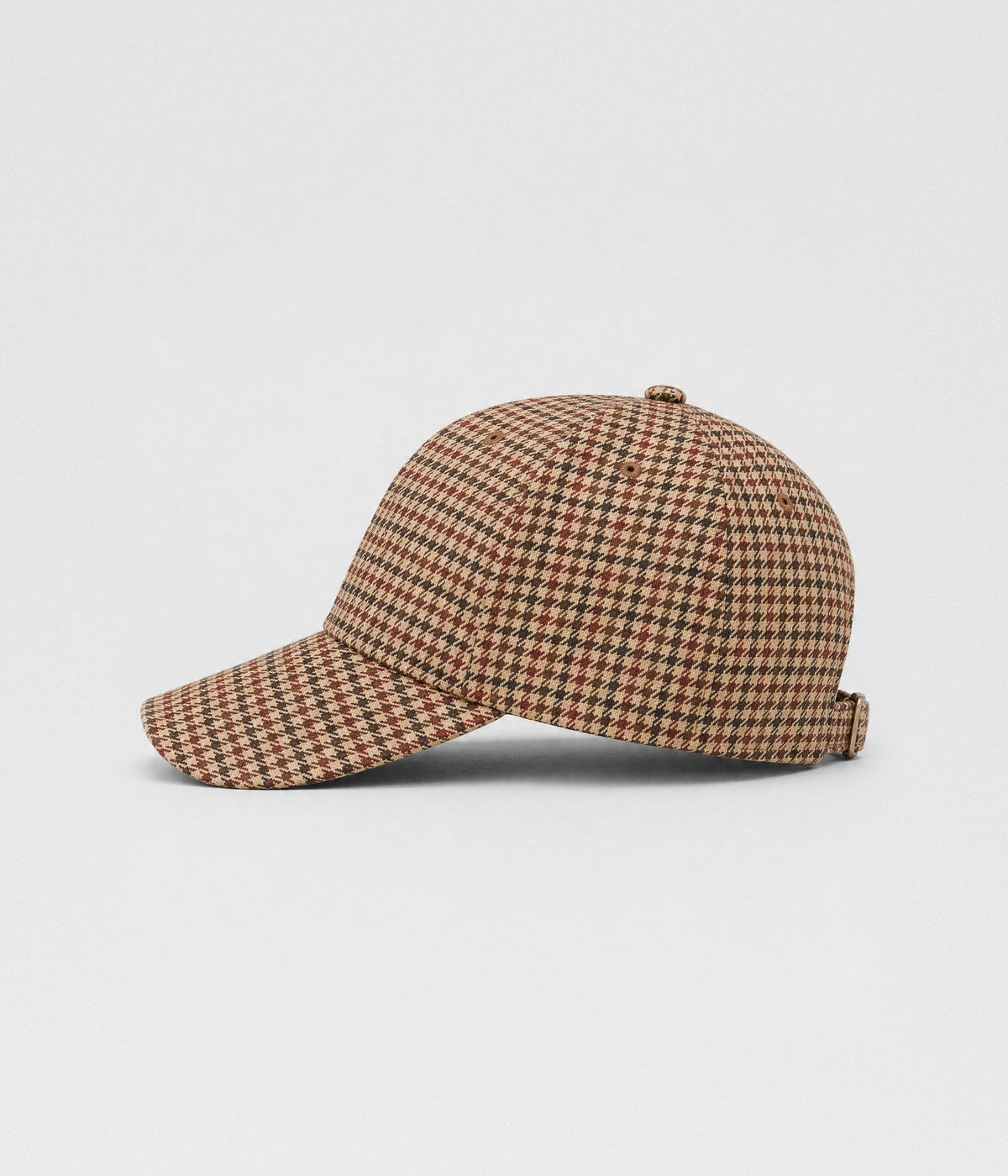 HOUNDSTOOTH. woven houndstooth check cap in red, side view