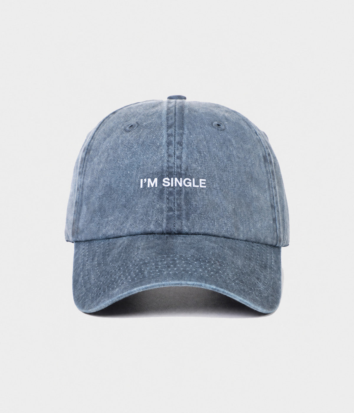 WASHED I'M SINGLE. washed cotton dad cap in NAVY, front view