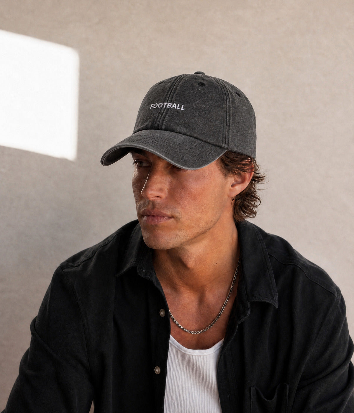 FOOTBALL. worn by a man