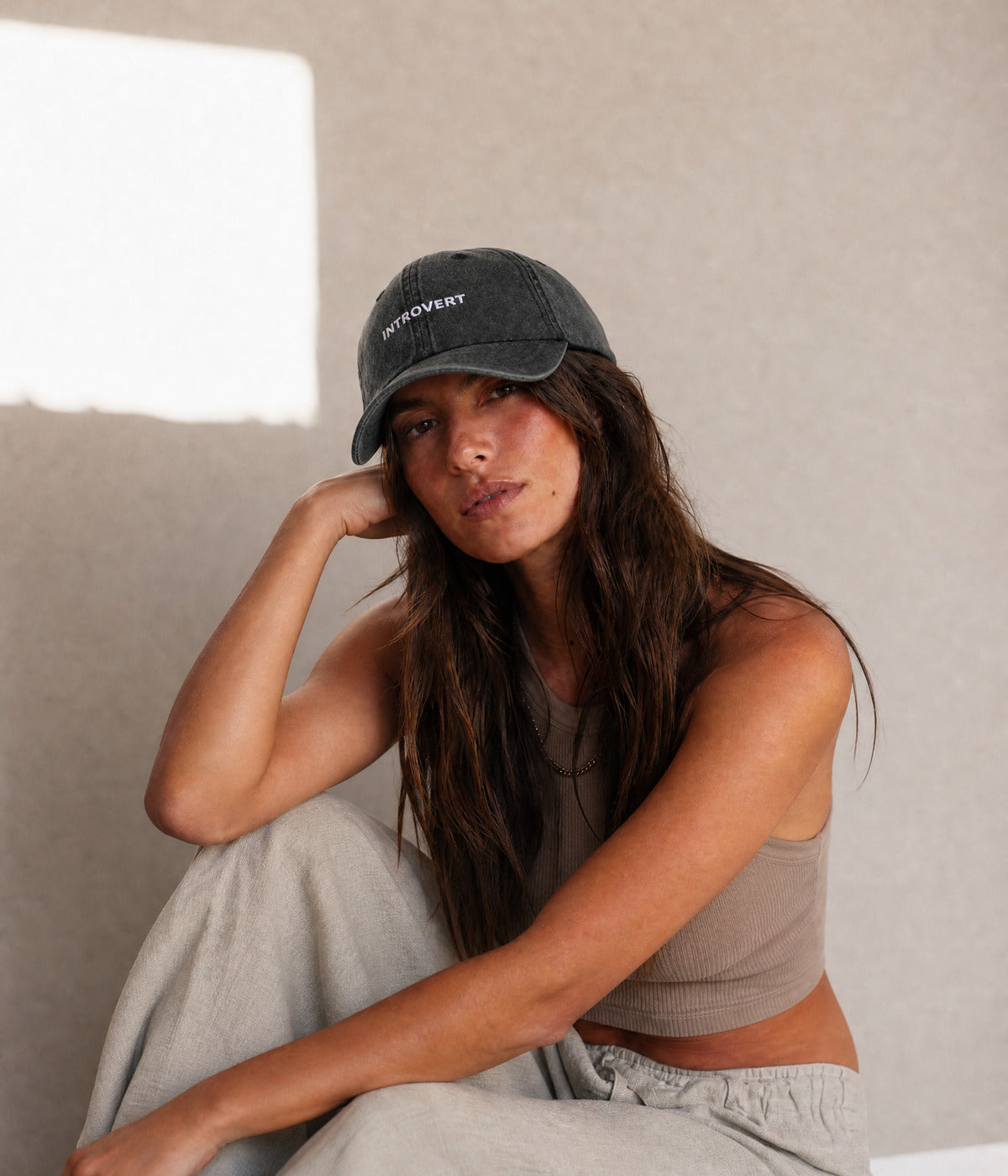 INTROVERT. worn by a woman