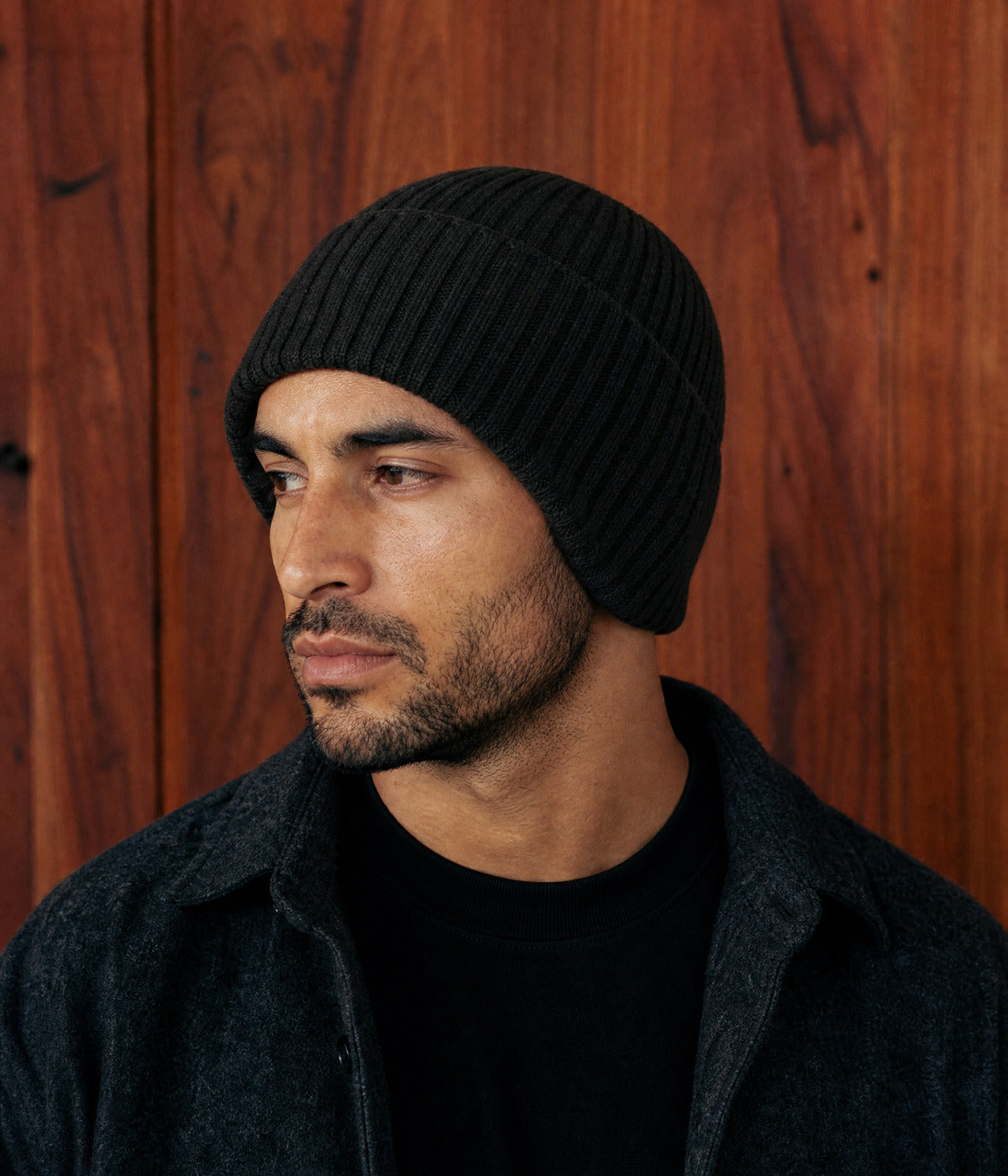 KNIT EARMUFF BEANIE. — BLACK worn