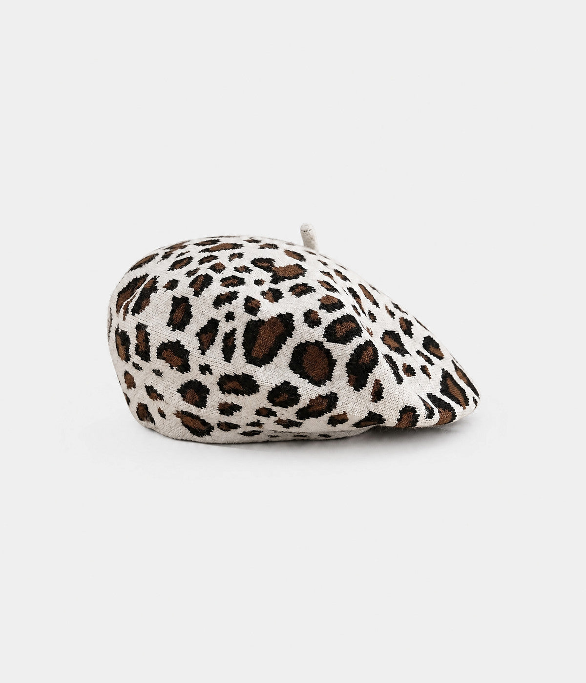 KNITTED LEOPARD BERET. knit beret in WHITE, front view