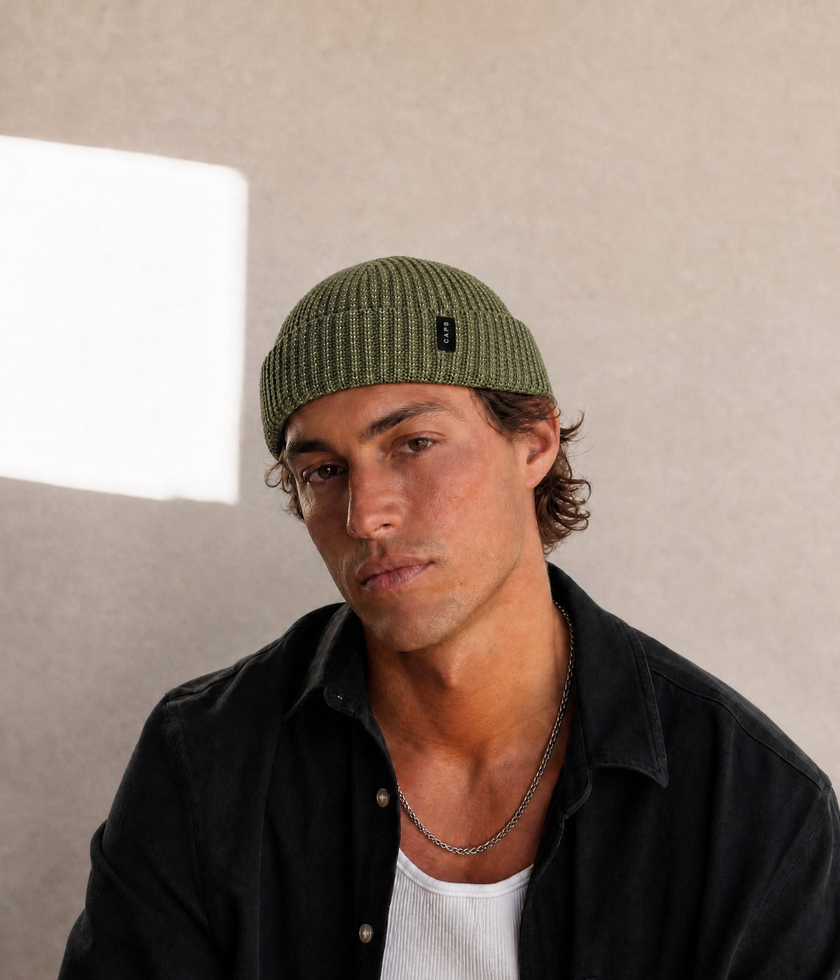 LOGO REFLECTIVE BEANIE. — GREEN worn