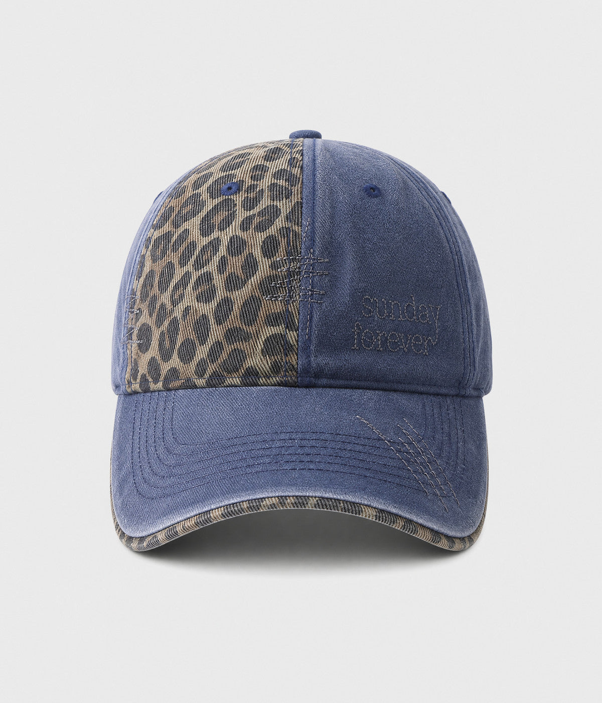 SUNDAY FOREVER. washed half-leopard dad cap in NAVY, front view