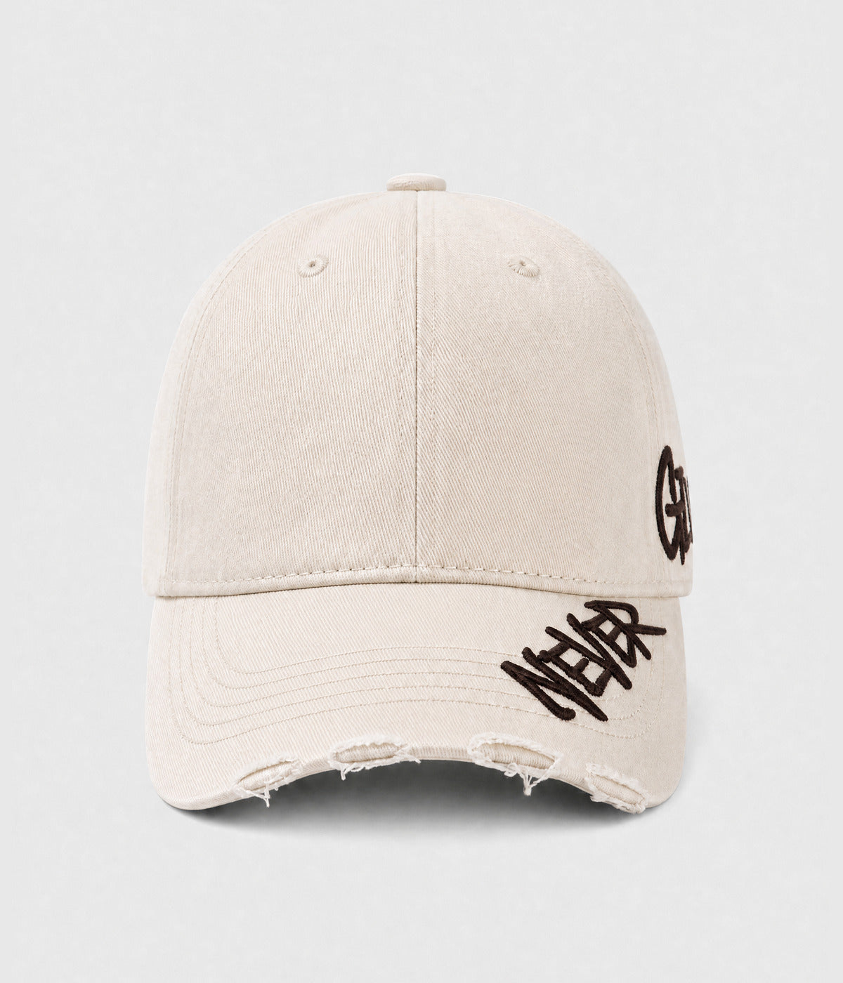 NEVER GIVE UP. washed distressed cotton dad cap in BEIGE, front view