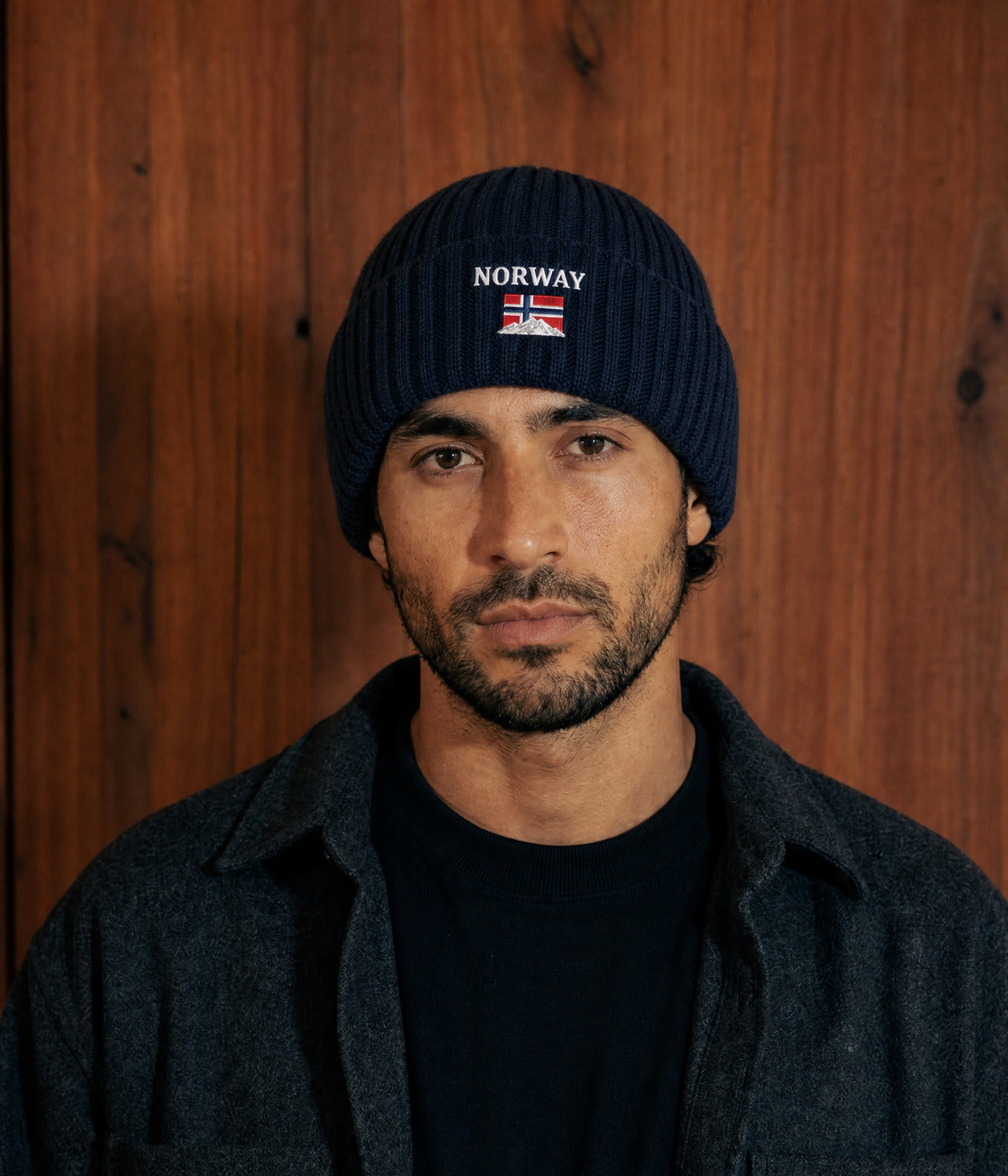 NORWAY FLEECE BEANIE. — NAVY worn