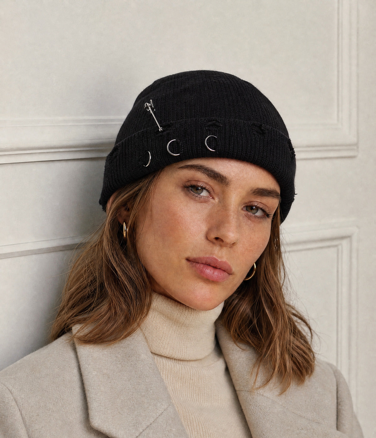 PIERCED FISHERMAN BEANIE. — BLACK worn
