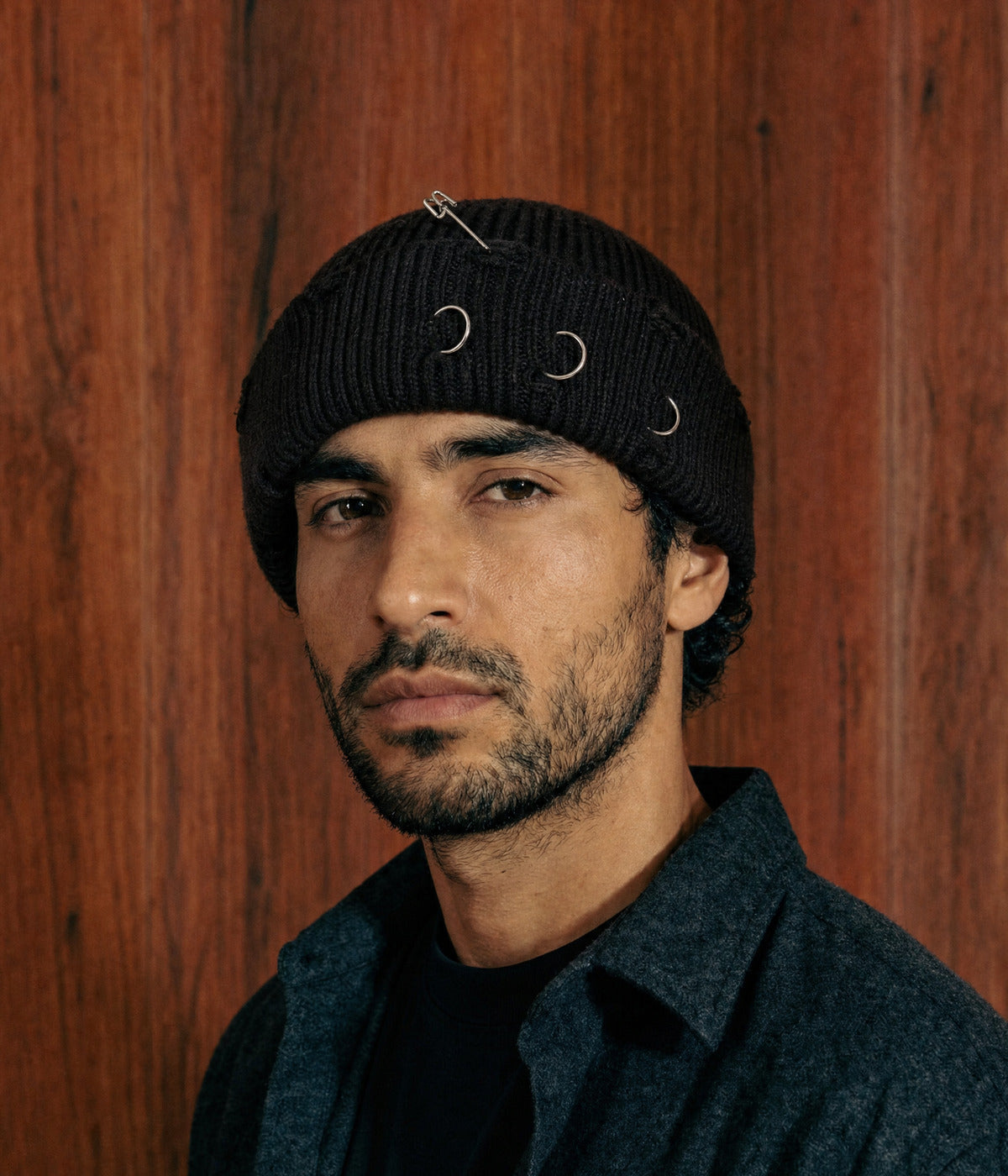 PIERCED FISHERMAN BEANIE. — BLACK worn