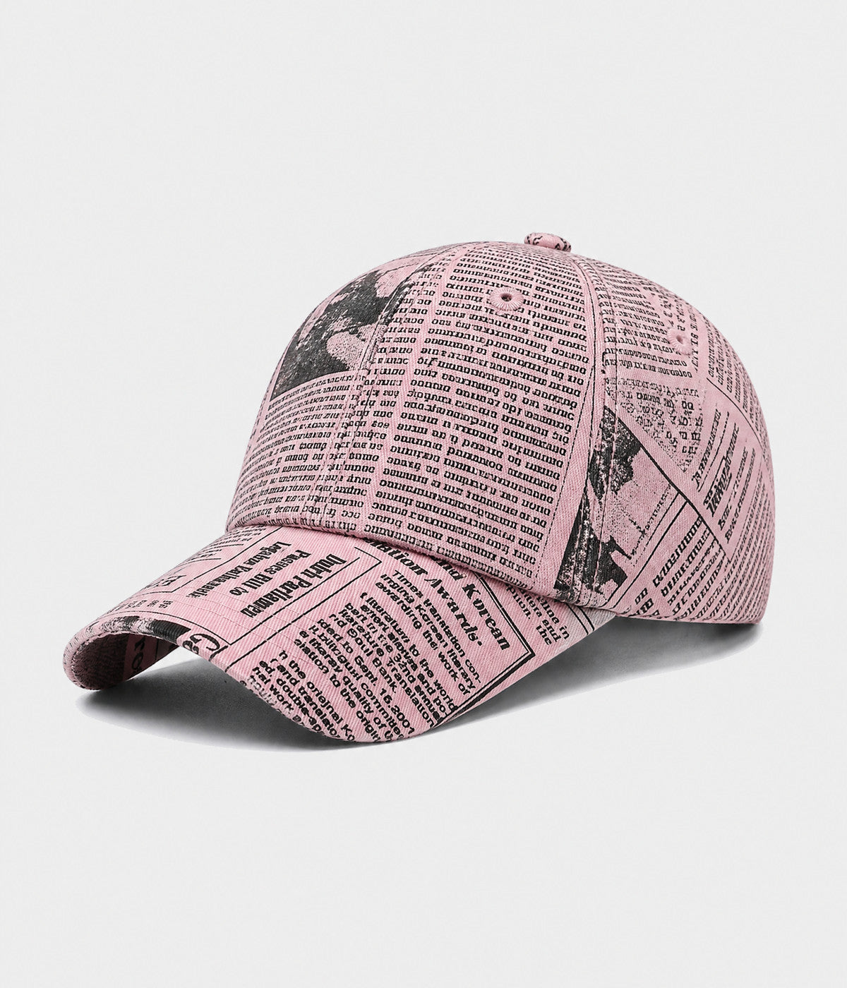 NEWSPRINT. cotton twill newsprint-print cap in pink, side view
