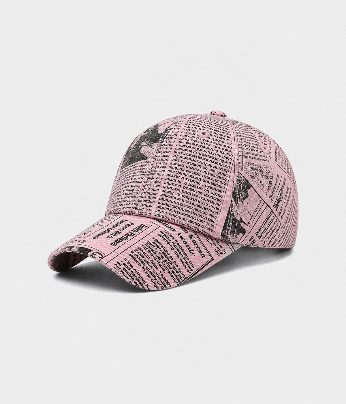 NEWSPRINT. cotton twill newsprint-print cap in pink, side view
