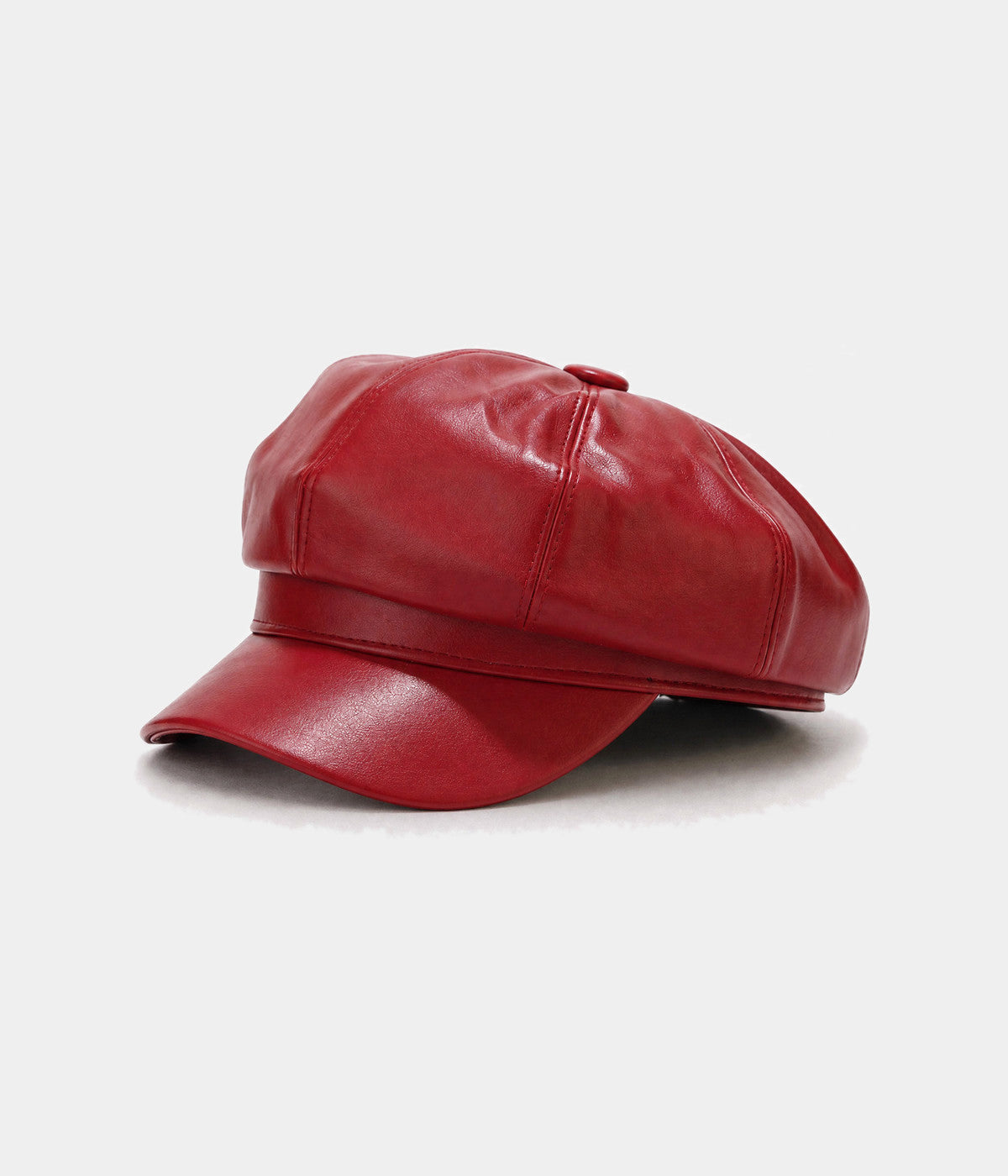 FAUX LEATHER NEWSBOY. faux-leather newsboy cap in RED, side view