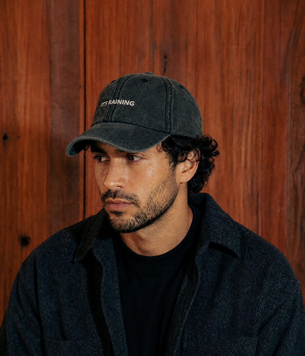 RAINING. worn by a man