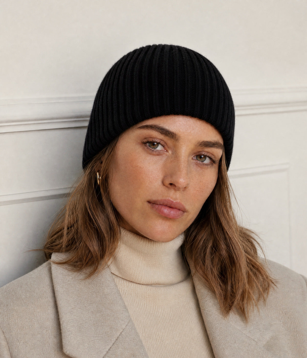 RIB KNIT BEANIE. — BLACK worn