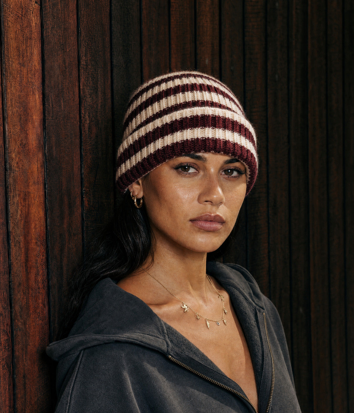 STRIPED BEANIE. — DARK RED worn