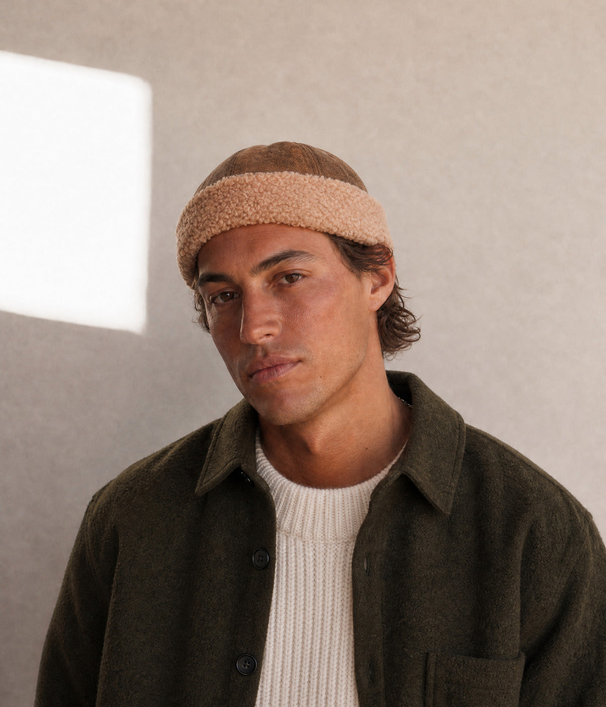 TEDDY FISHERMAN BEANIE. — BROWN worn