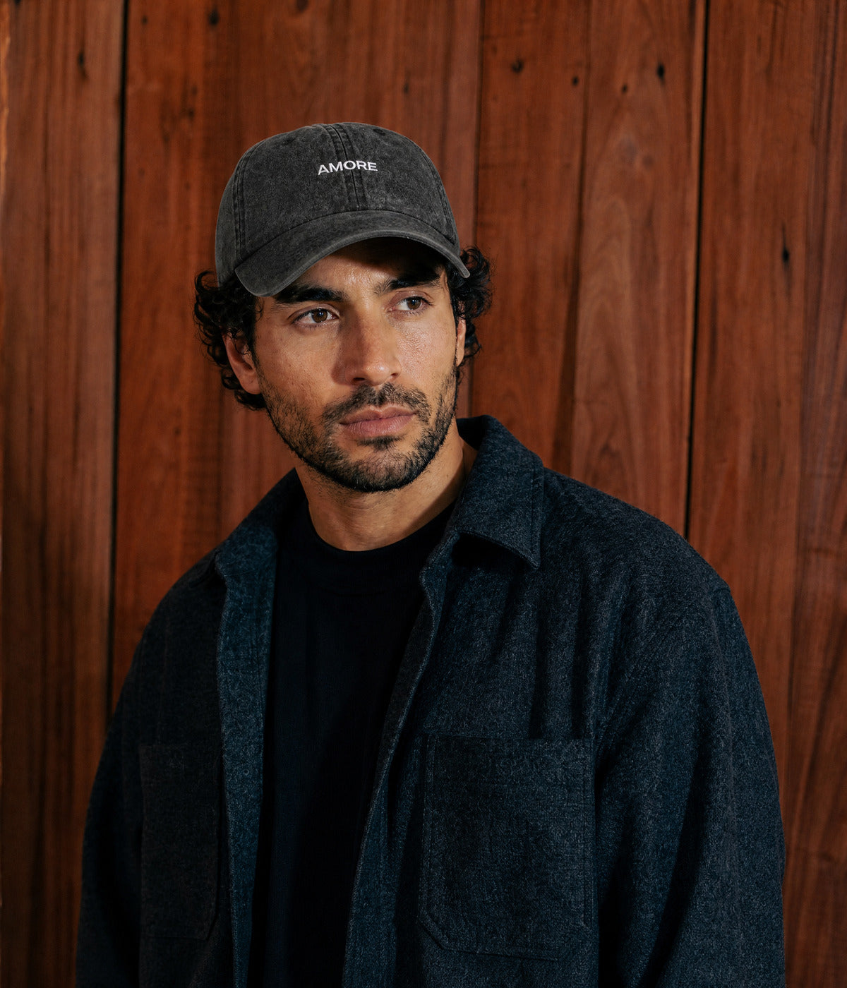 WASHED AMORE. BLACK worn by a man