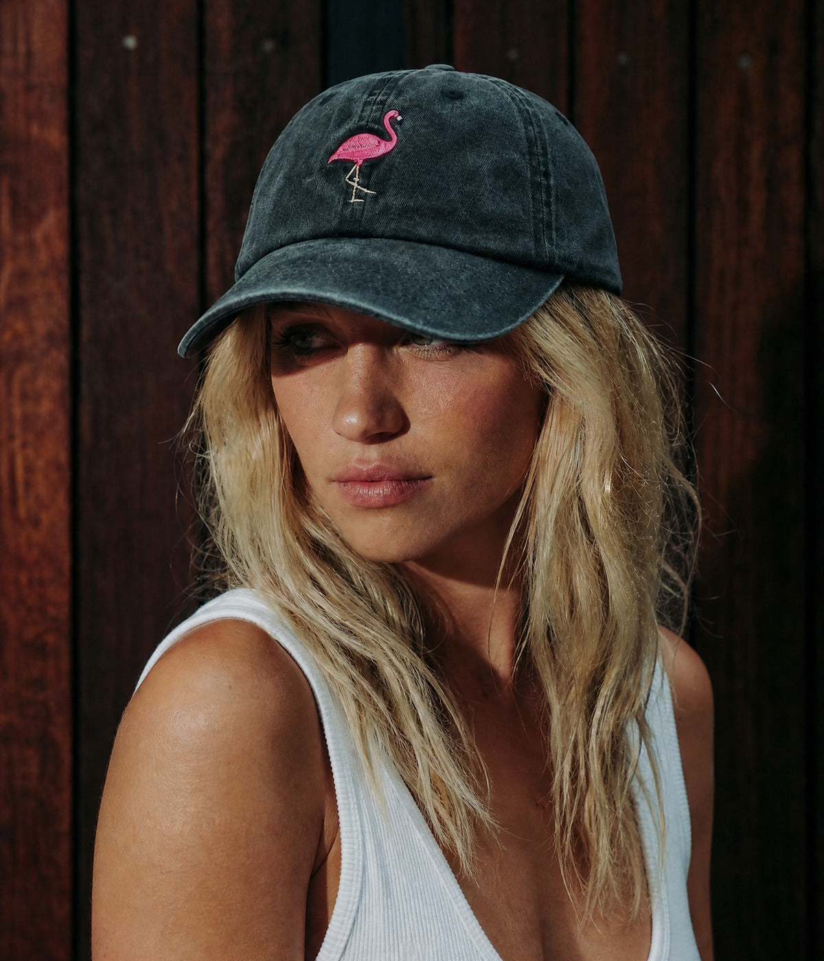 WASHED FLAMINGO. BLACK worn by a woman