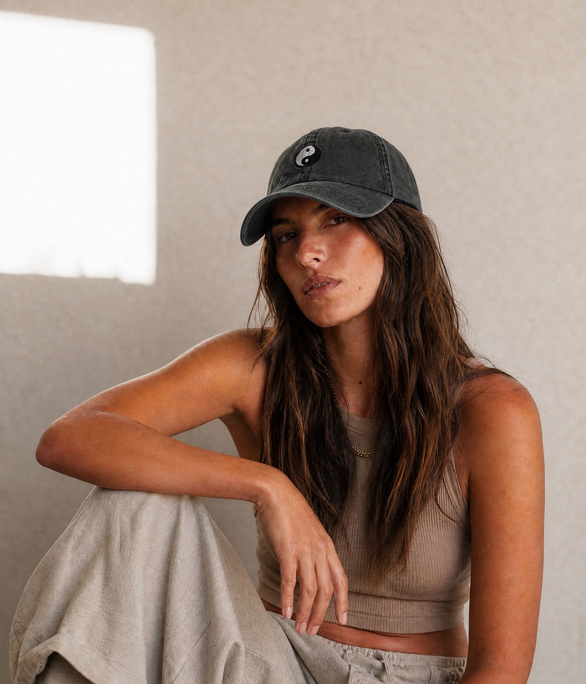 WASHED YIN-YANG. worn by a woman