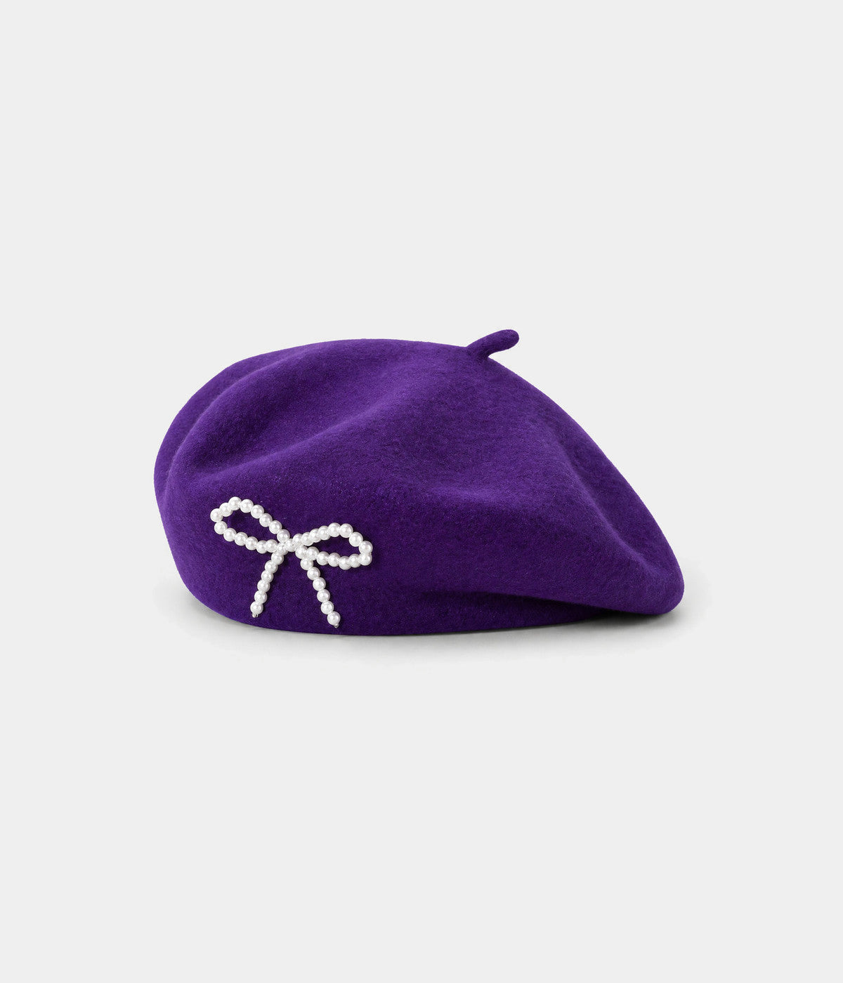 PEARL BOW BERET. wool beret in PURPLE, front view