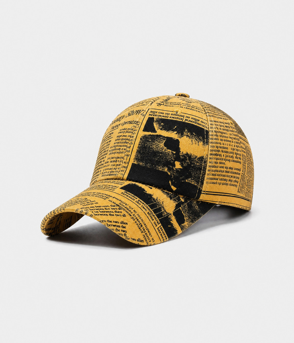 NEWSPRINT. cotton twill newsprint-print cap in yellow, side view