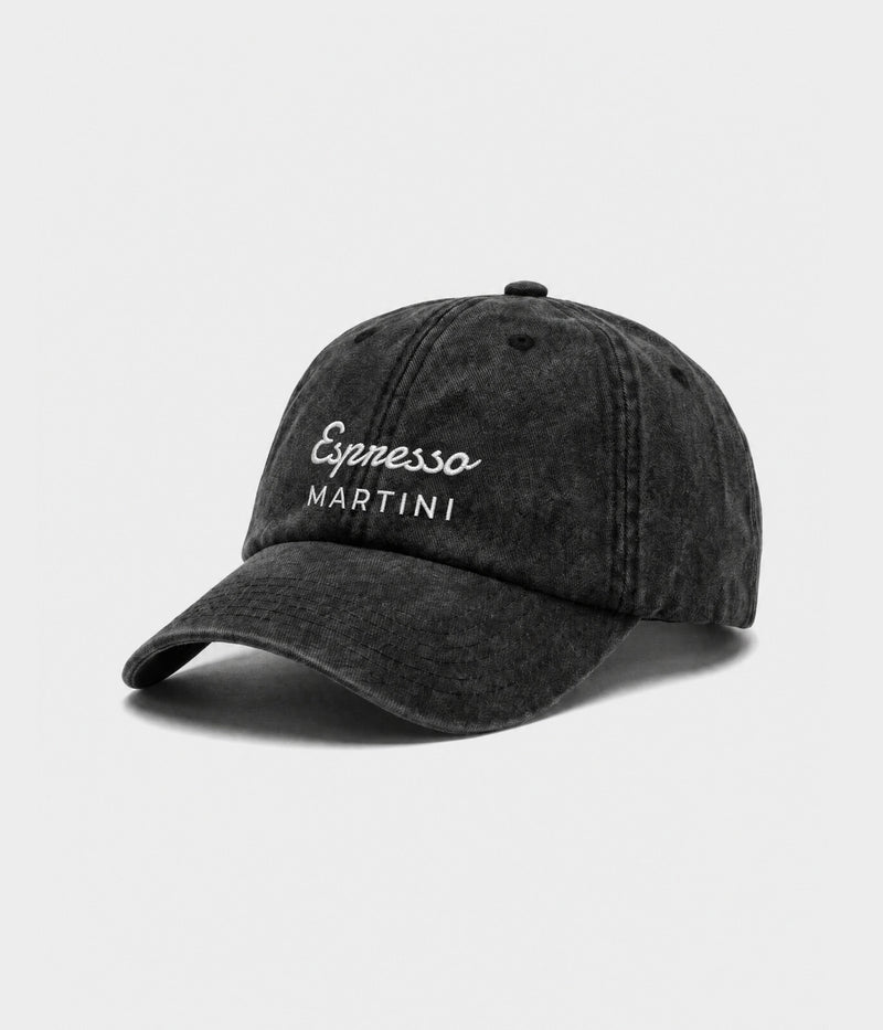 ESPRESSO MARTINI. washed black cotton dad cap with embroidered Espresso Martini wordmark, side view