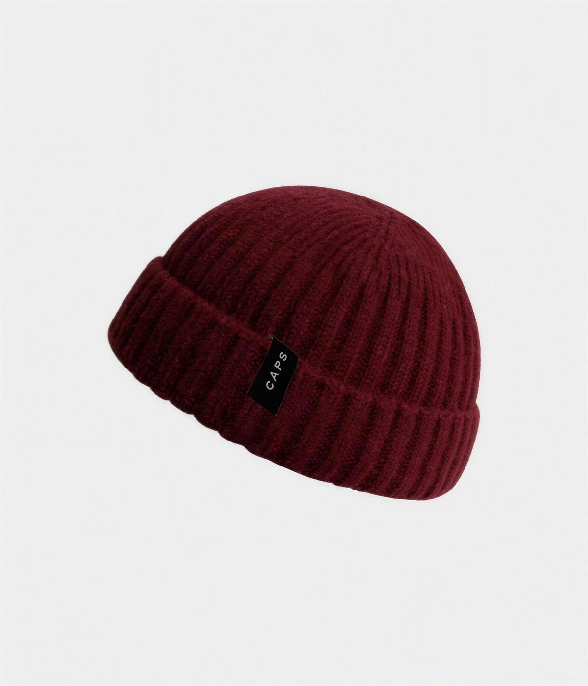 LOGO WOOL FISHERMAN BEANIE. in red with CAPS logo label