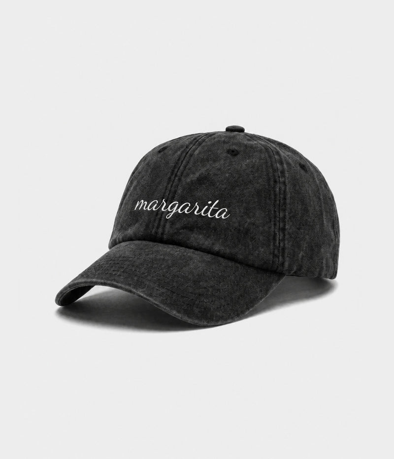 MARGARITA - CURSIVE. washed black cotton dad cap with embroidered margarita script, side view