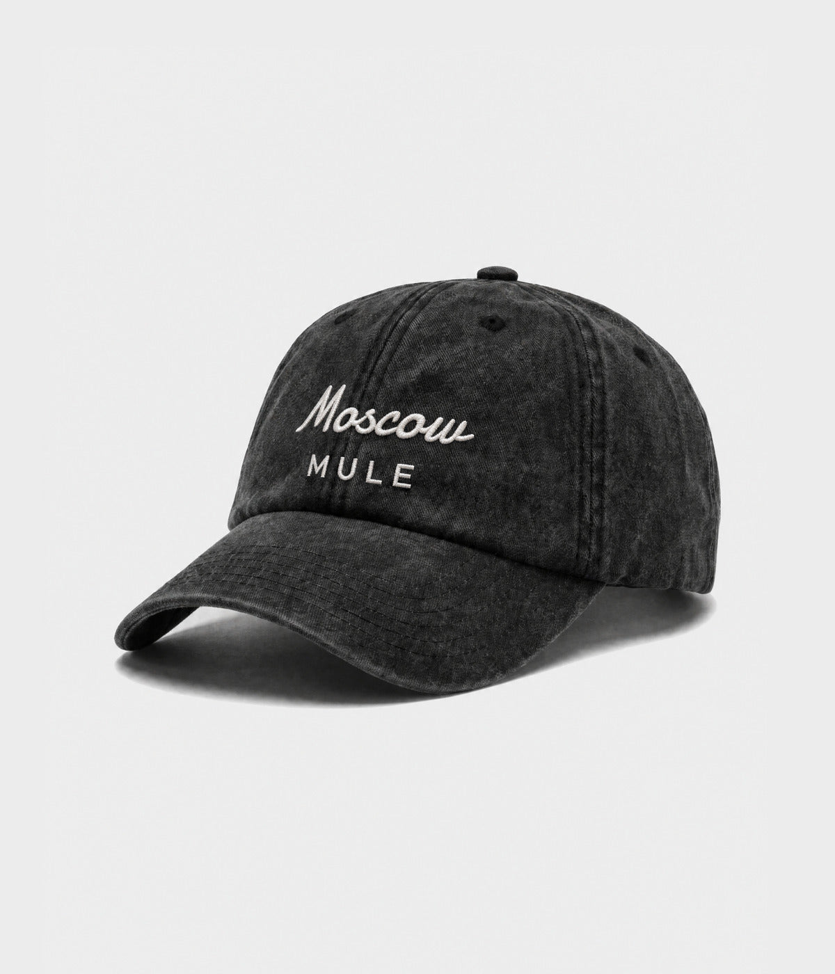 MOSCOW MULE. washed black cotton dad cap with embroidered Moscow Mule wordmark, side view