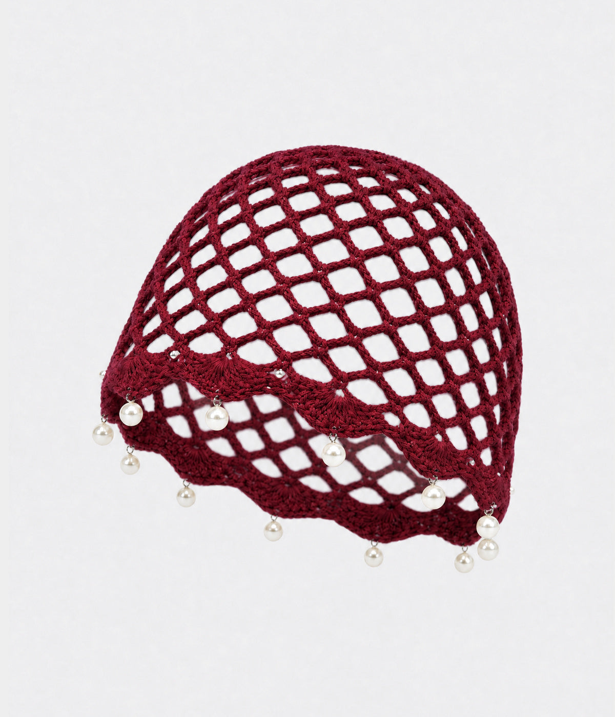 PEARL CROCHET CAP. open-mesh crochet cloche with pearl trim in red, front view