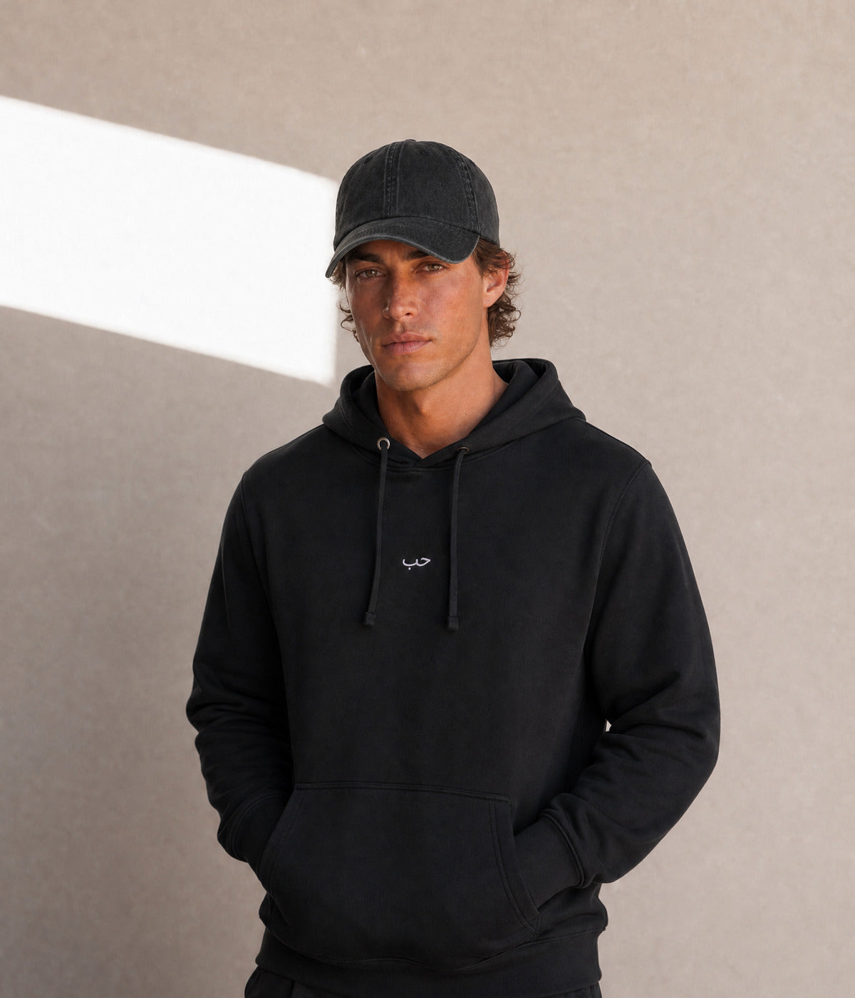 ARABIC LOVE HOODIE. on model