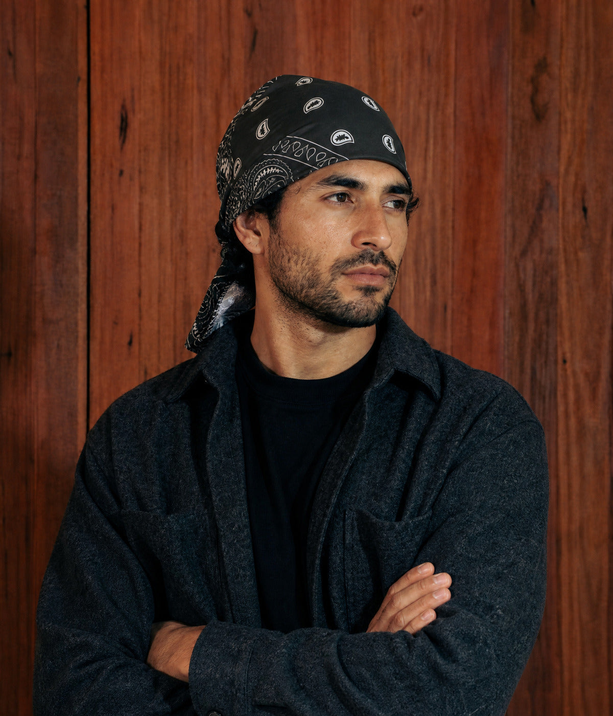 BANDANA CAP. BLACK worn by a man