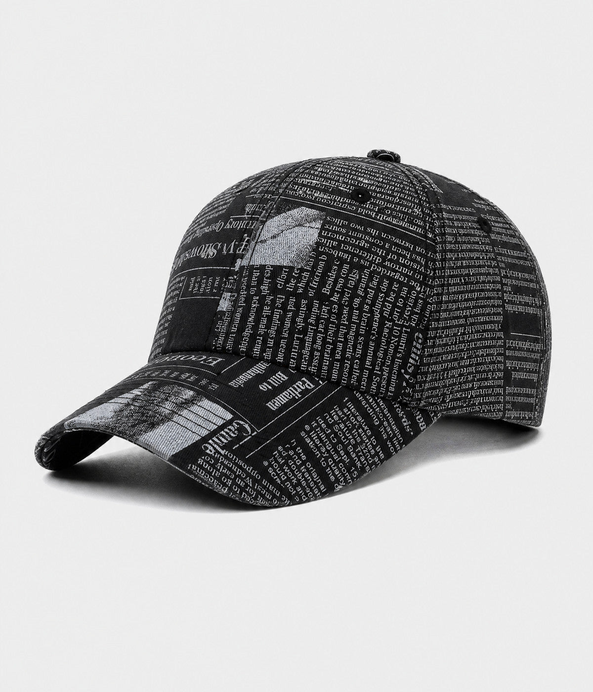 NEWSPRINT. cotton twill newsprint-print cap in black, side view