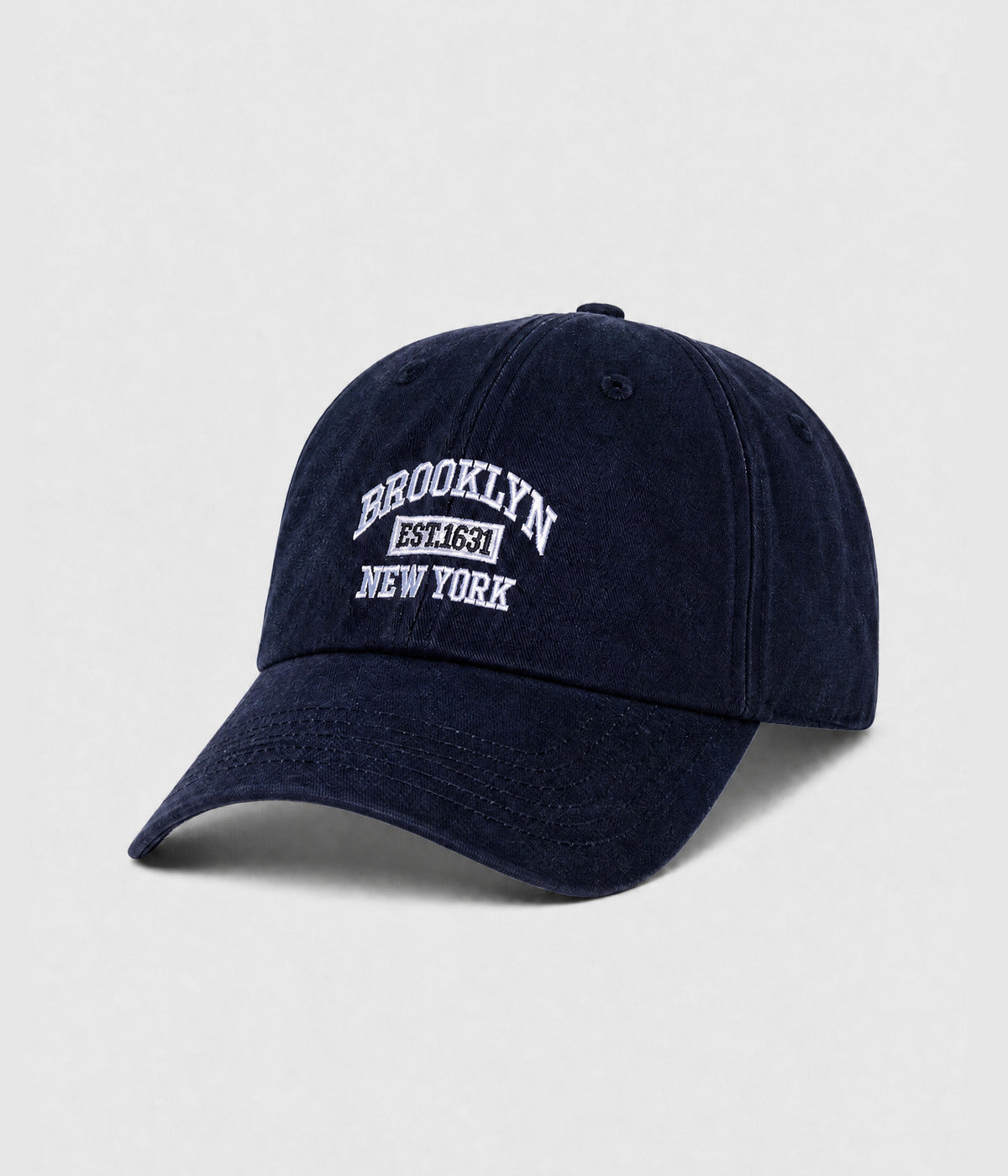 BROOKLYN NY. washed cotton dad cap in navy, side view