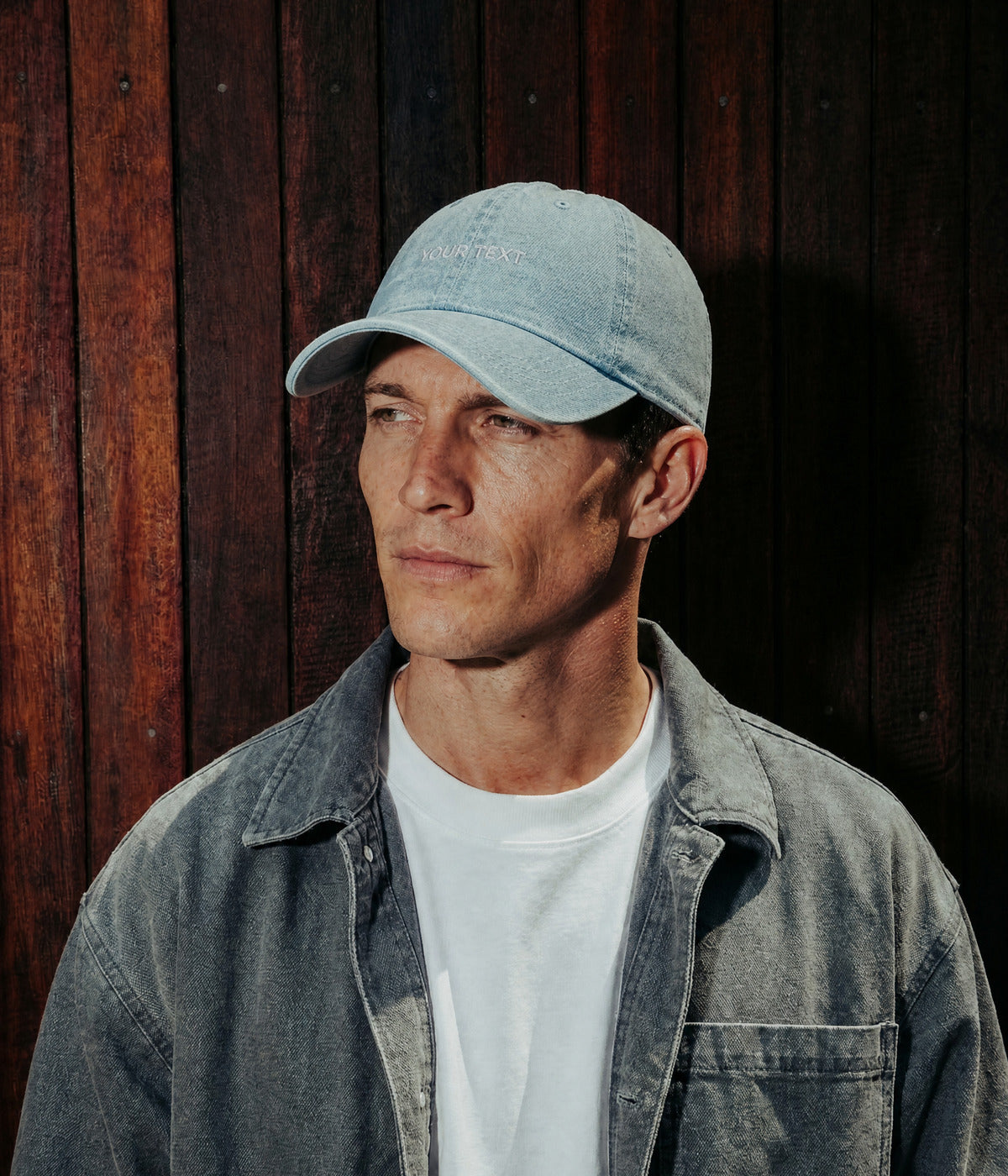 CUSTOM DENIM CAP. LIGHT BLUE worn by a man