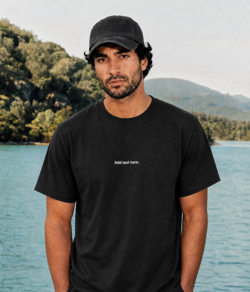 CUSTOM TEE. BLACK worn by a man