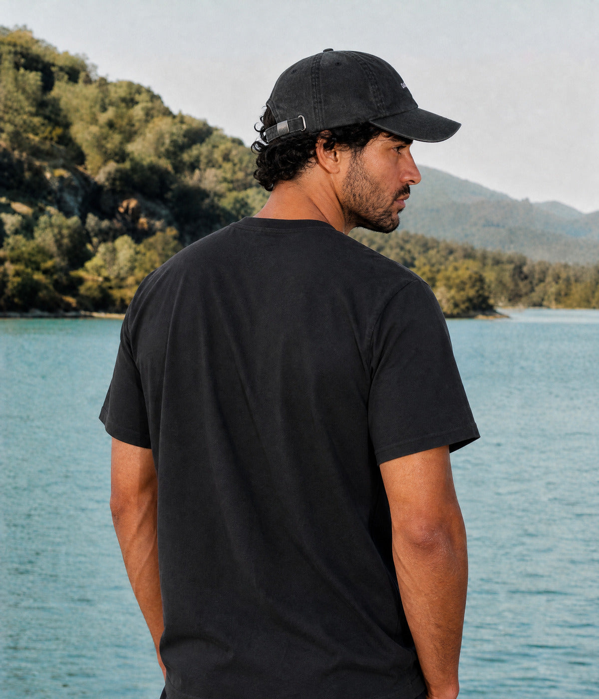 DADDY TEE. BLACK worn by a man, back view